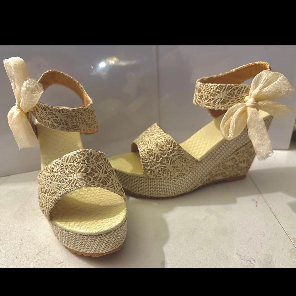 Women’s Tan and Gold Wedge Sandals. New W/O Box. Size 7.5 run wide.